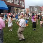People dancing downtown Middlebury